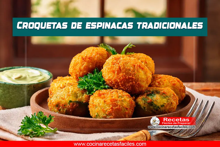Croquetas de espinaca crujientes servidas con salsa alioli