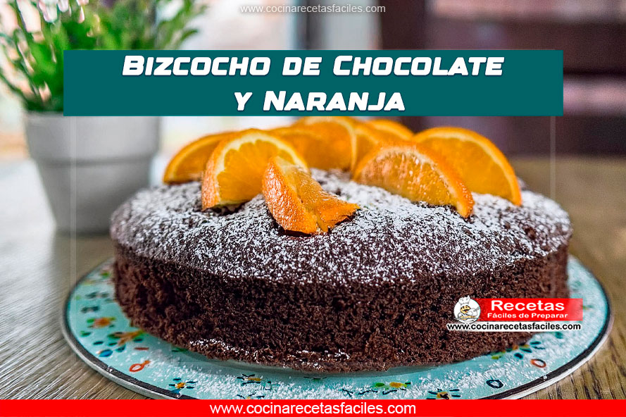 Bizcocho de chocolate y naranja servido en una mesa rústica con decoración cítrica.