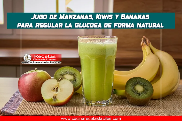 "Jugo energético de manzanas, kiwis y bananas servido sobre una mesa de madera en la cocina."