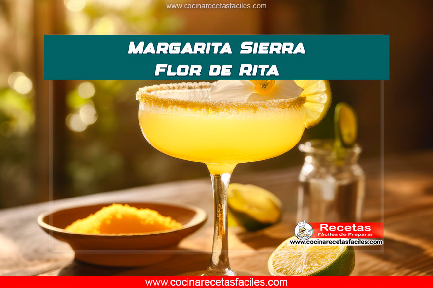 Margarita floral servida en vaso escarchado con una flor comestible