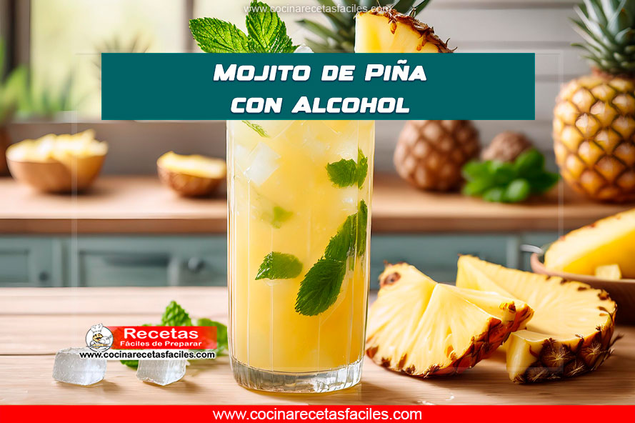 Mojito de piña con alcohol servido en un vaso alto con menta y piña