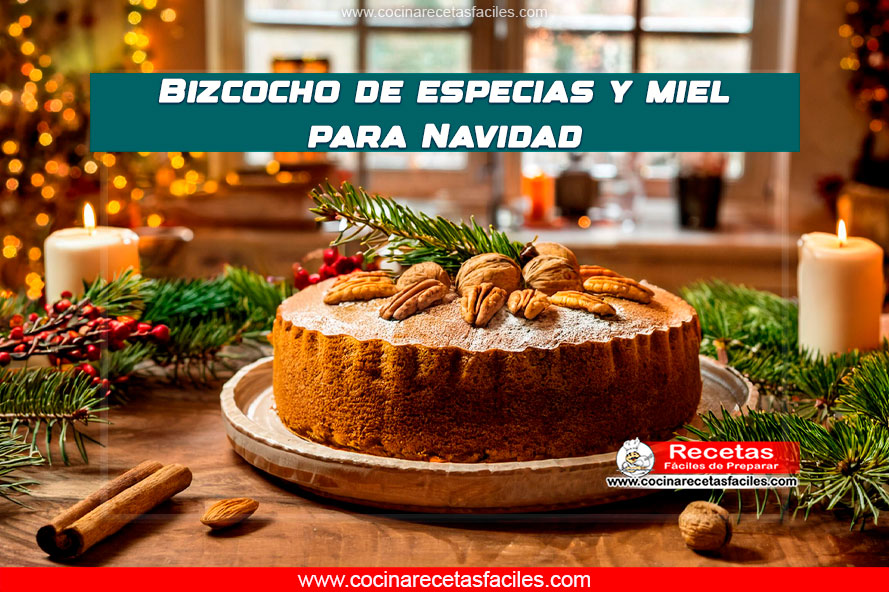 Bizcocho de especias y miel, decorado con frutos secos, servido en un plato blanco, con un fondo navideño cálido