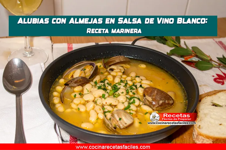 Alubias blancas con almejas servidas en salsa de vino blanco, sobre una mesa de cocina con ventana.