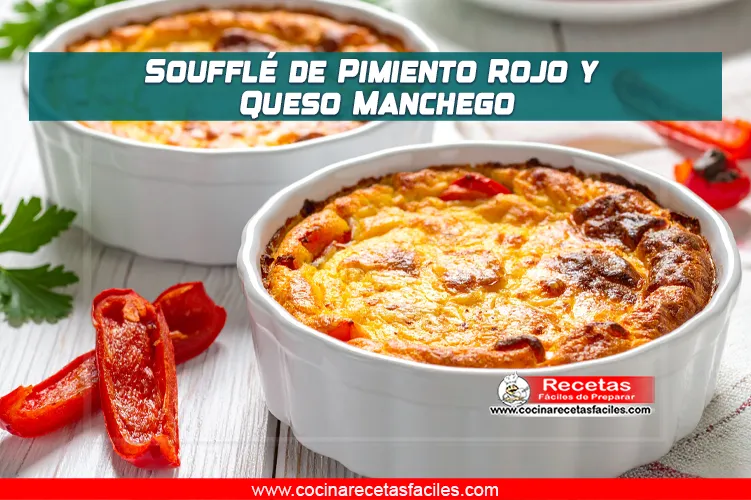 Soufflé de pimiento rojo y queso manchego dorado en ramekin blanco, con tiras de pimiento asado al lado.